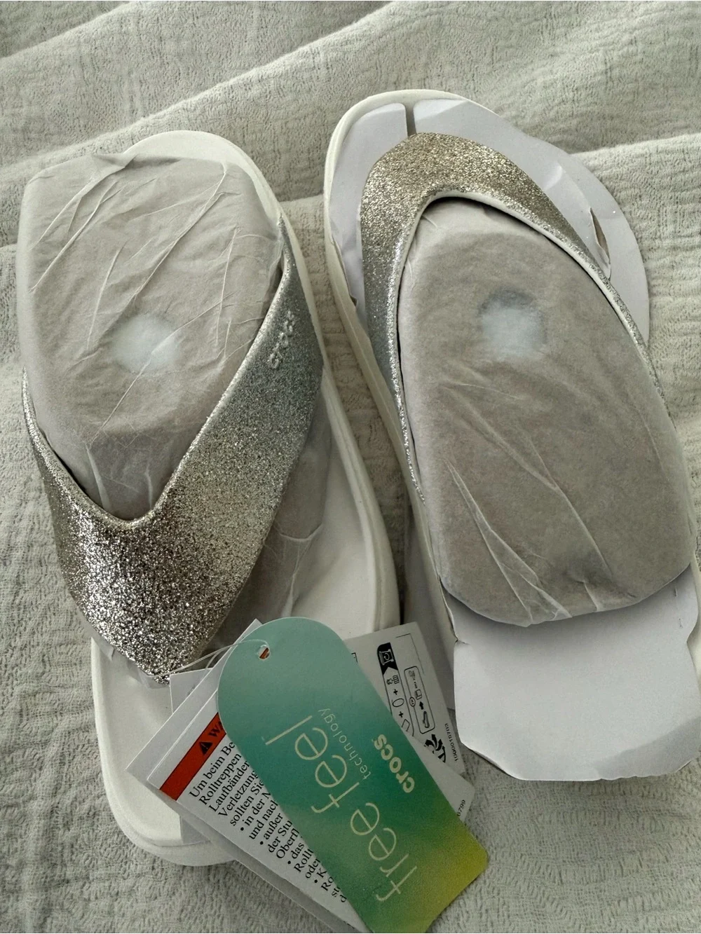 CROCS Metallic Silver Slide Sandals with White Sole